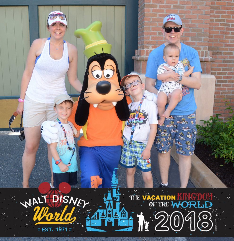 The whole family with Goofy at Walt Disney world 